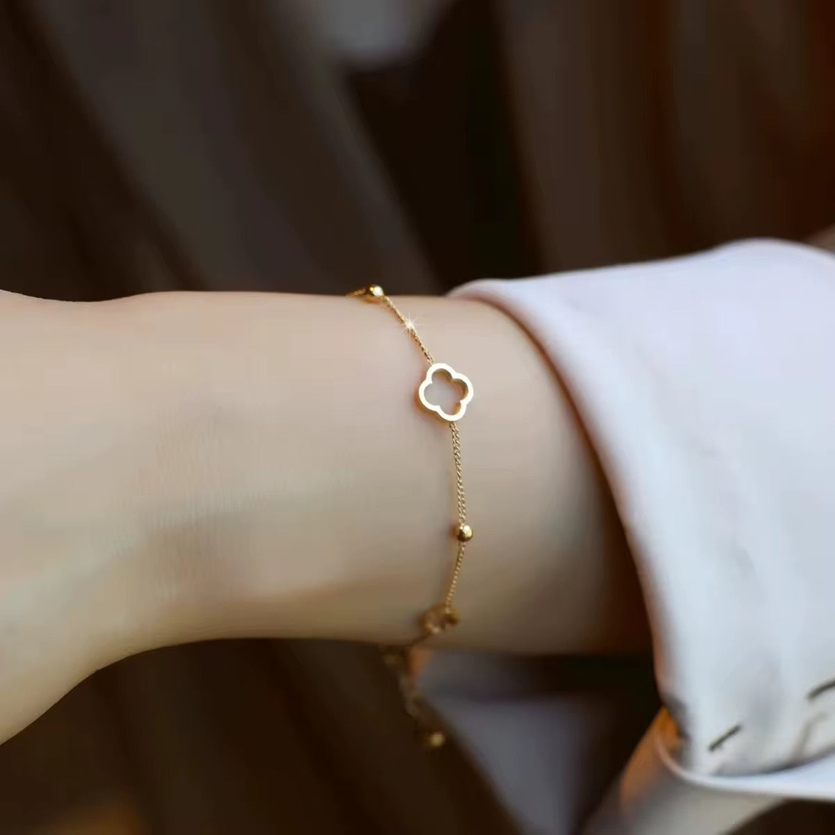 Gold-Plated Hollow Clover Charm Bracelet