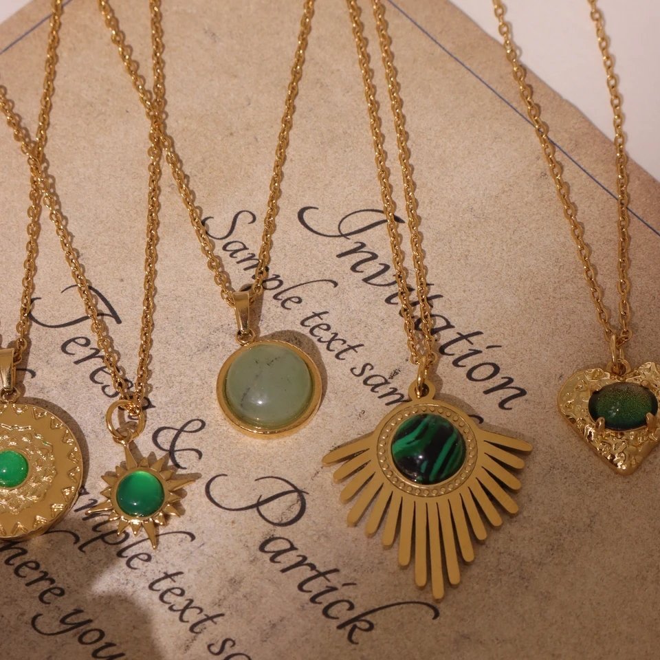 Elite Emerald Sunburst Pendant