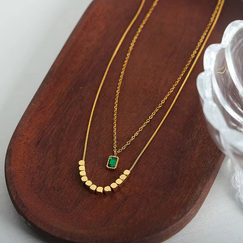 Emerald Studded Multilayered Gold Plated Necklace