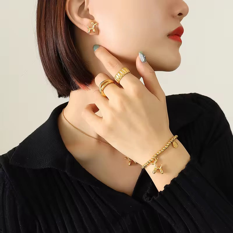 Gold Bead Bracelet with Balloon Poodle Dog and Good Luck Charm