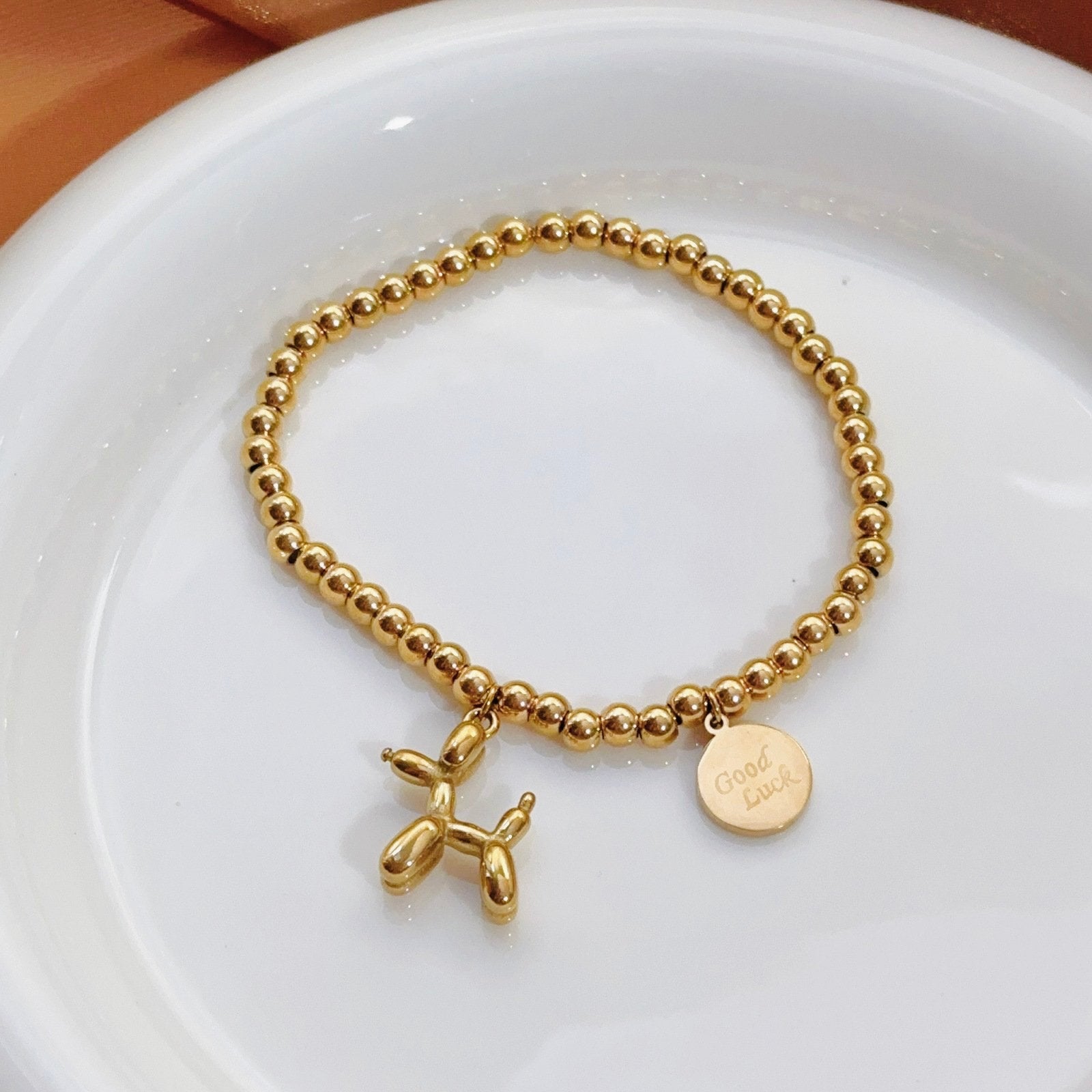 Gold Bead Bracelet with Balloon Poodle Dog and Good Luck Charm