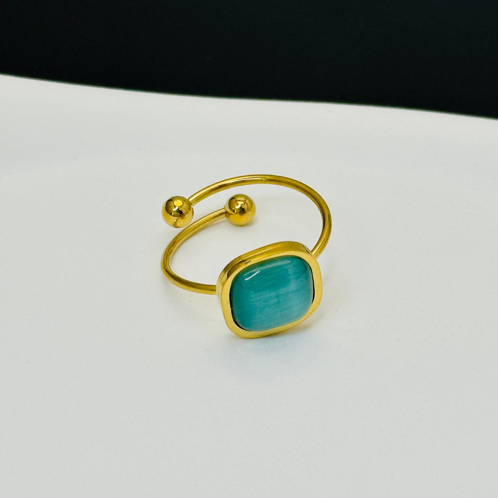 Modern Gold Plated Statement Ring with Teal Gemstone