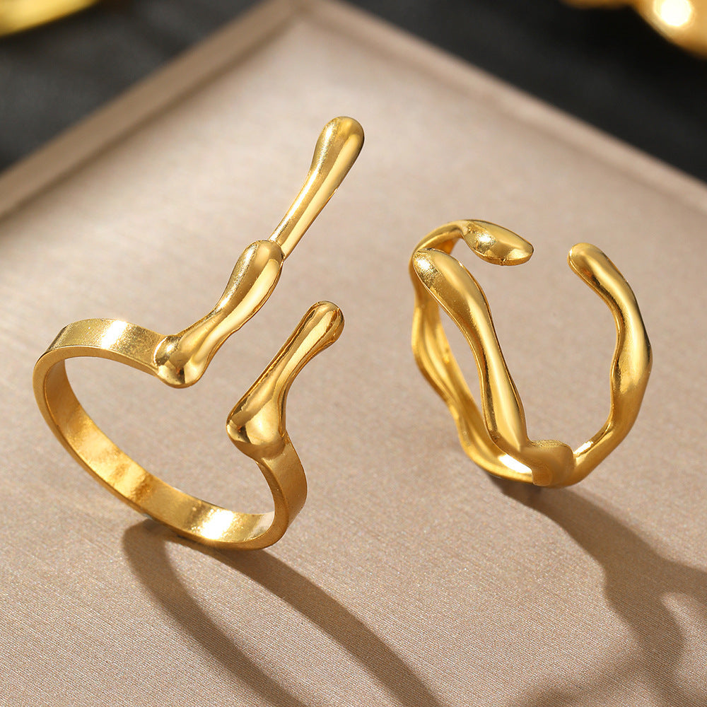 Aura Flow Adjustable Ring featuring an irregular geometric fluid shape in gold finish