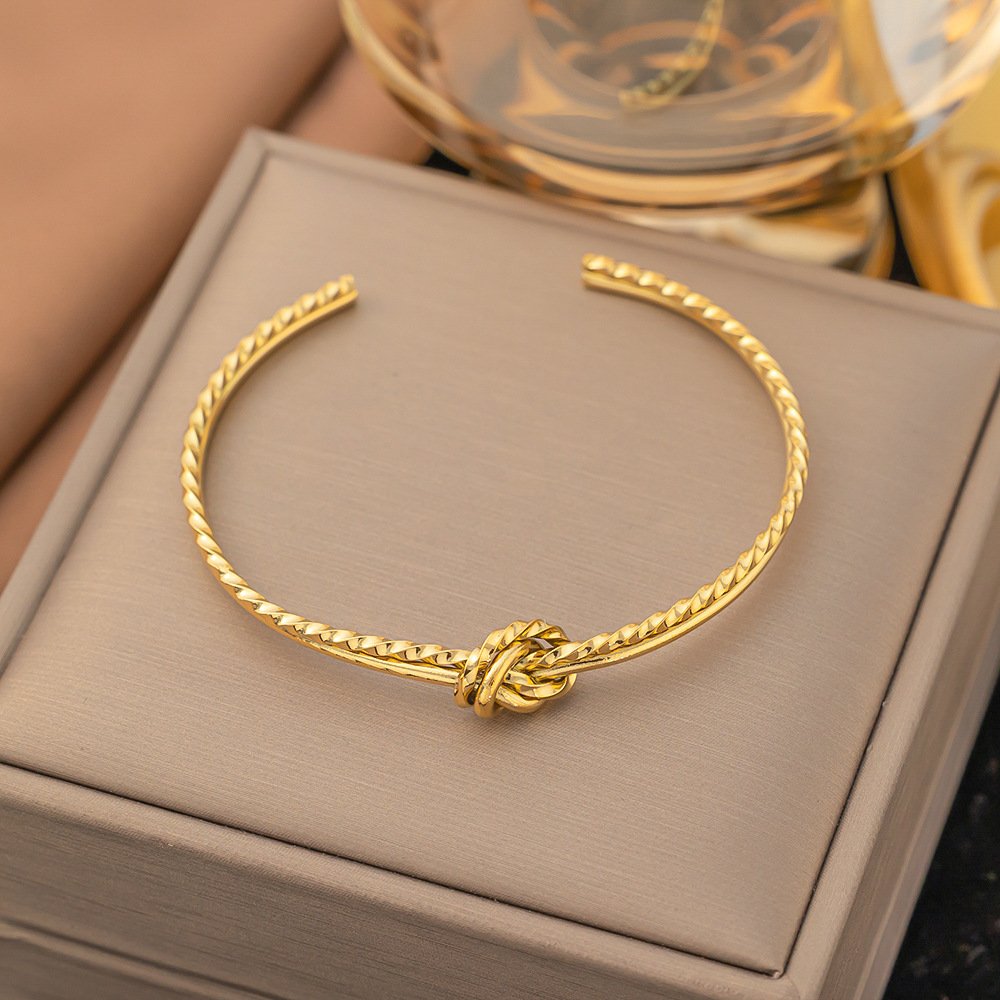 Twisted Knot Gold Plated Cuff Bangle