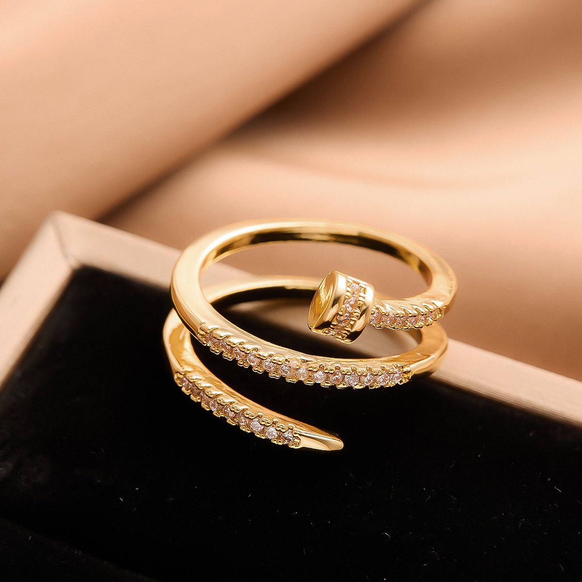 Crystal Studded Twisted Nail Ring