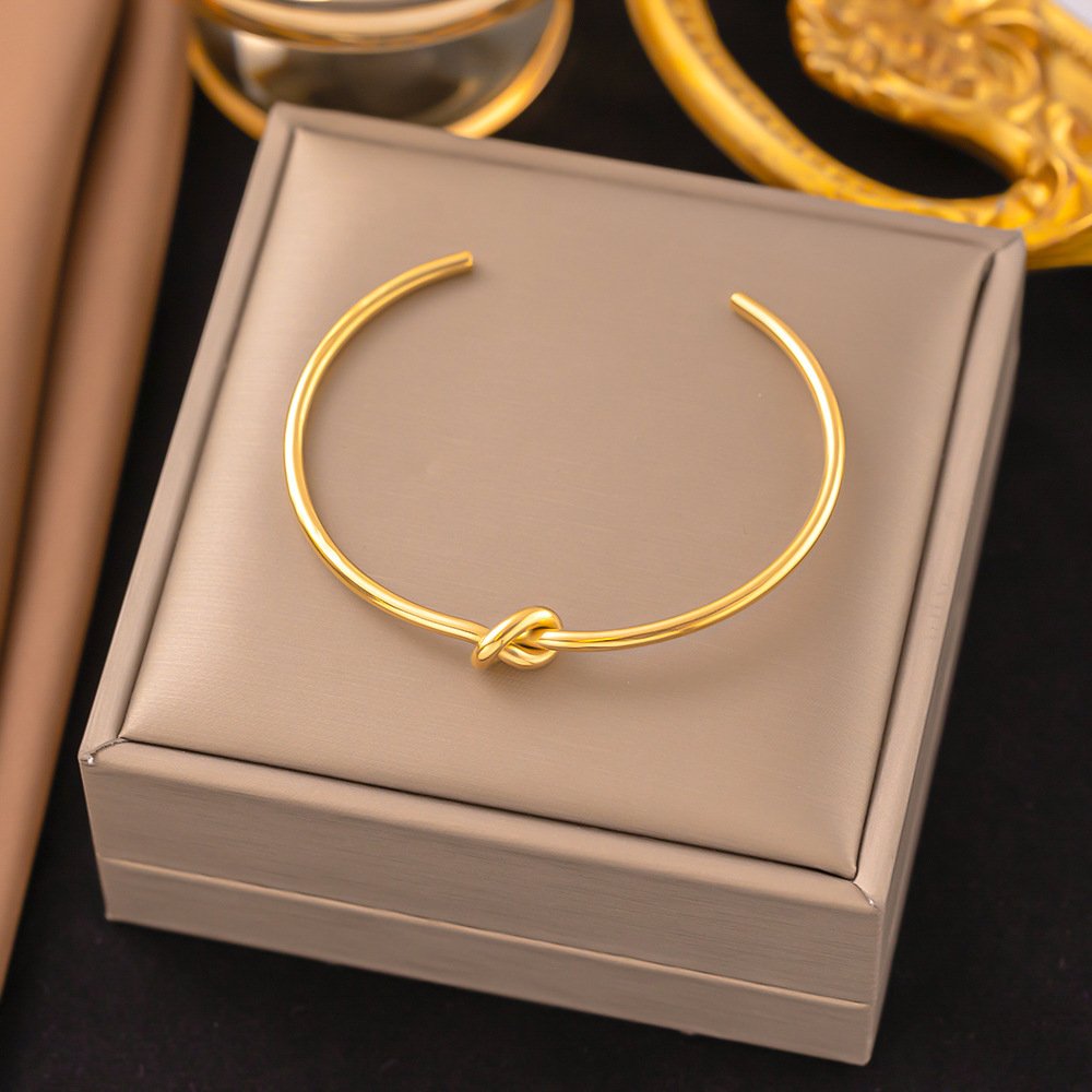 Knot Shaped Gold Plated Bangle
