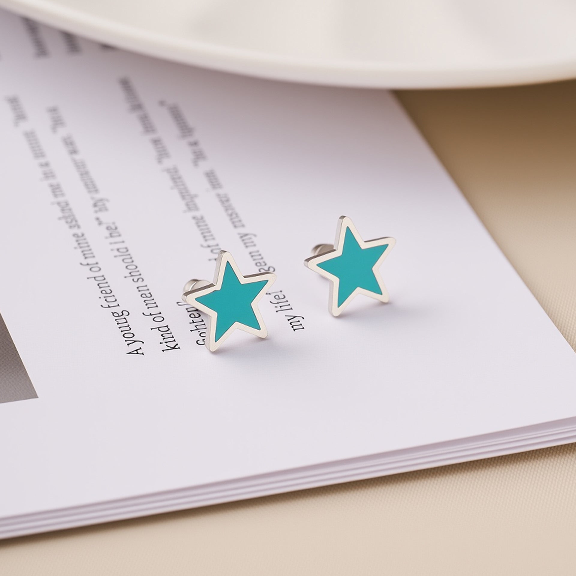 Green star enamel stud earrings in stainless steel