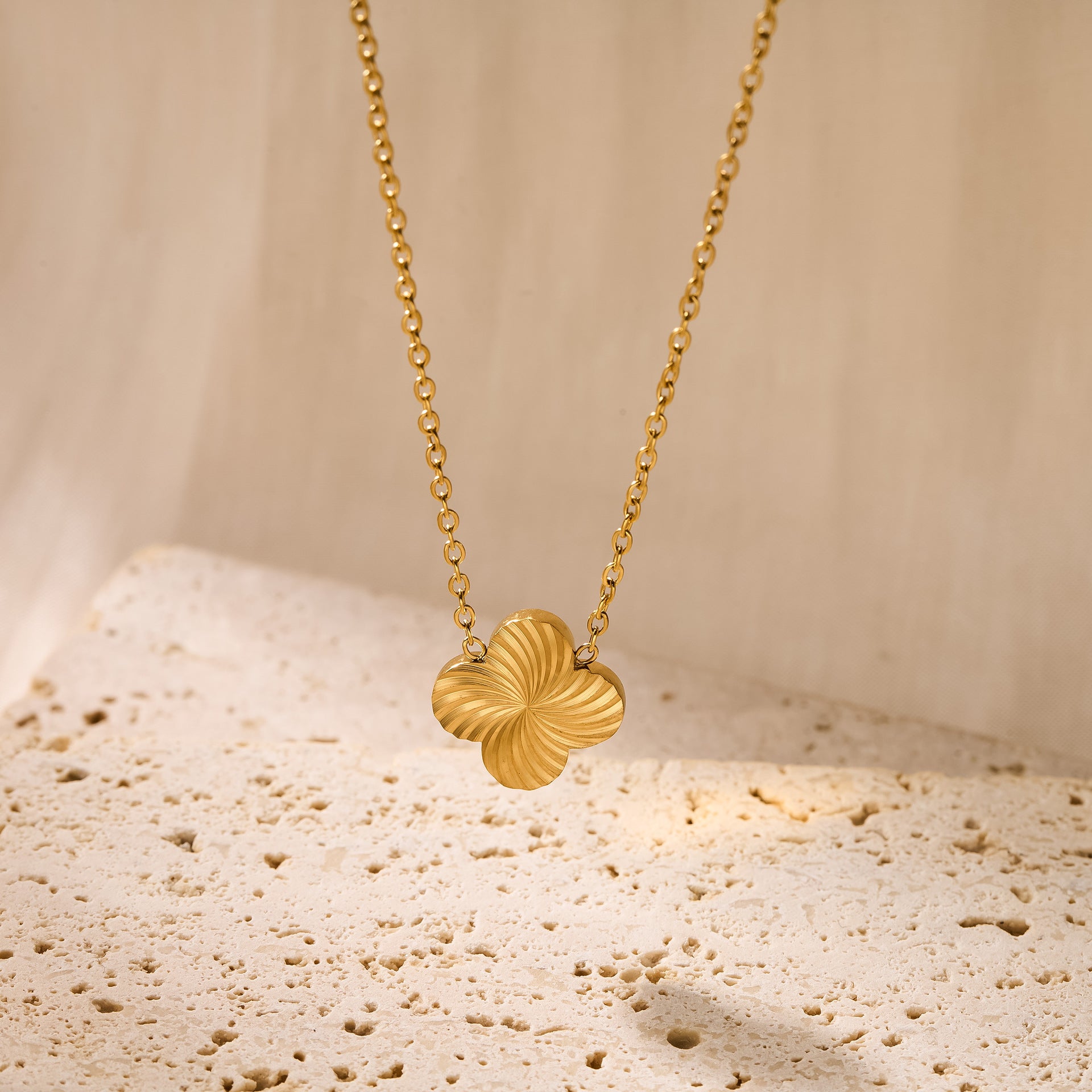 Elegant Gold-Plated Necklace with Swirl Clover Pendant