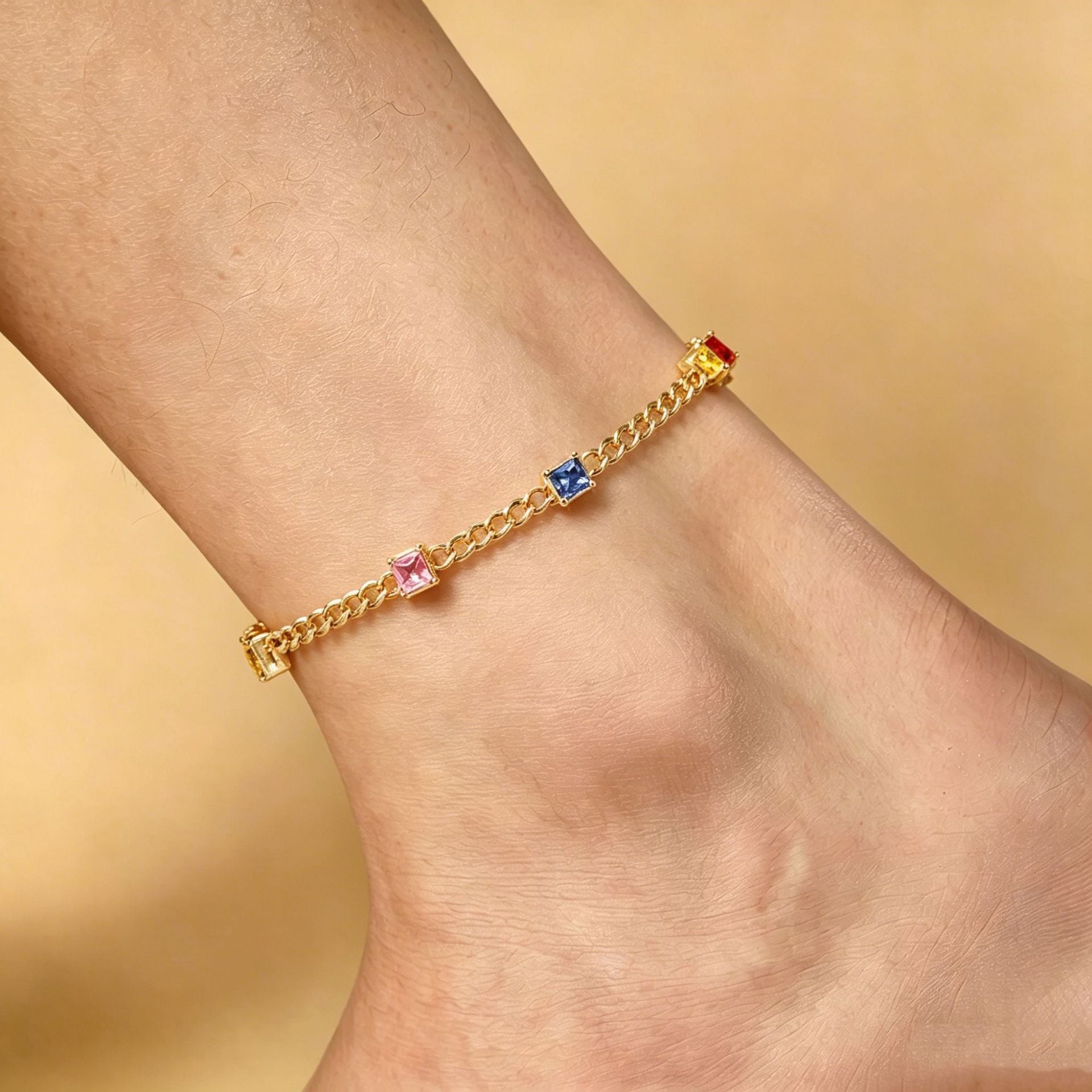 Gold chain anklet with spaced square colorful crystal-set stations