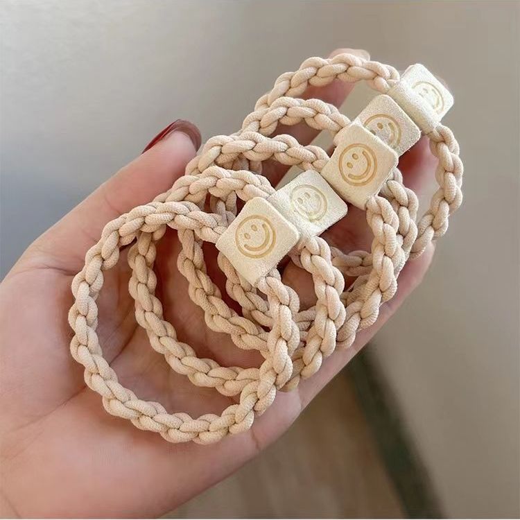 Beige braided hair tie