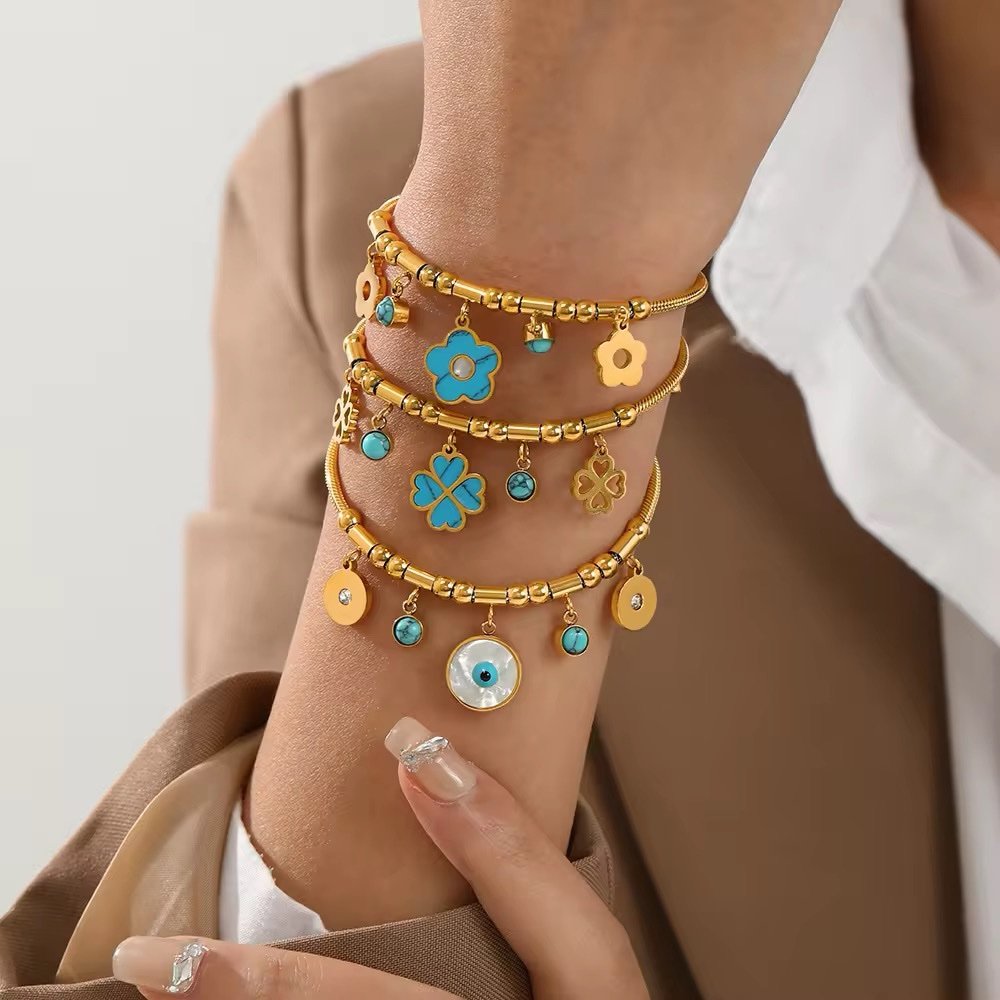 Gold Plated Stainless Steel Bracelet with Turquoise Clover Charms