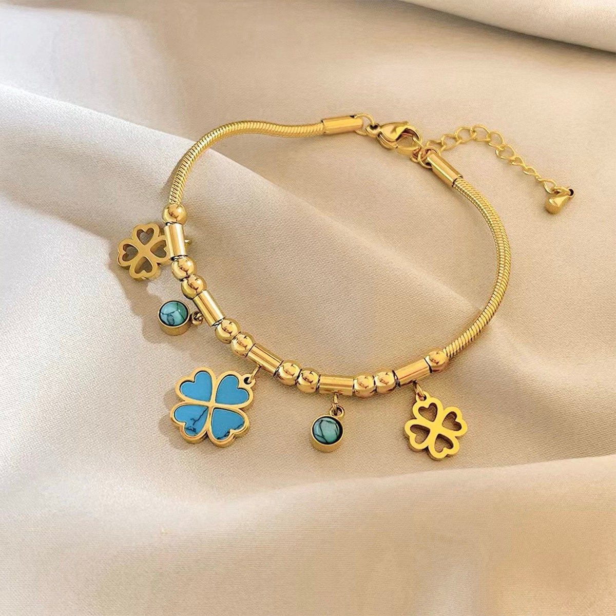 Gold Plated Stainless Steel Bracelet with Turquoise Clover Charms