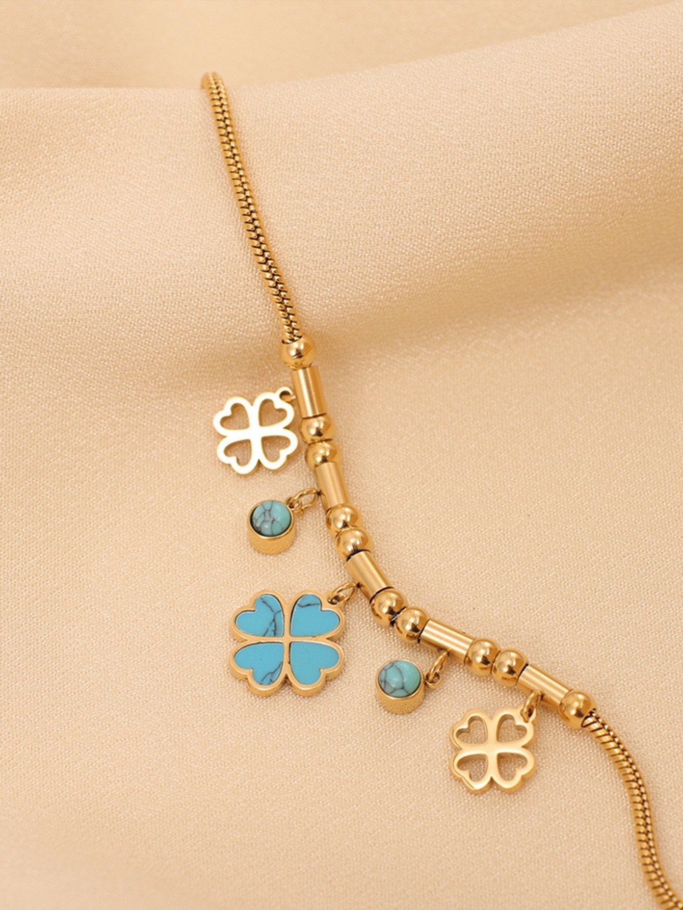 Gold Plated Stainless Steel Bracelet with Turquoise Clover Charms