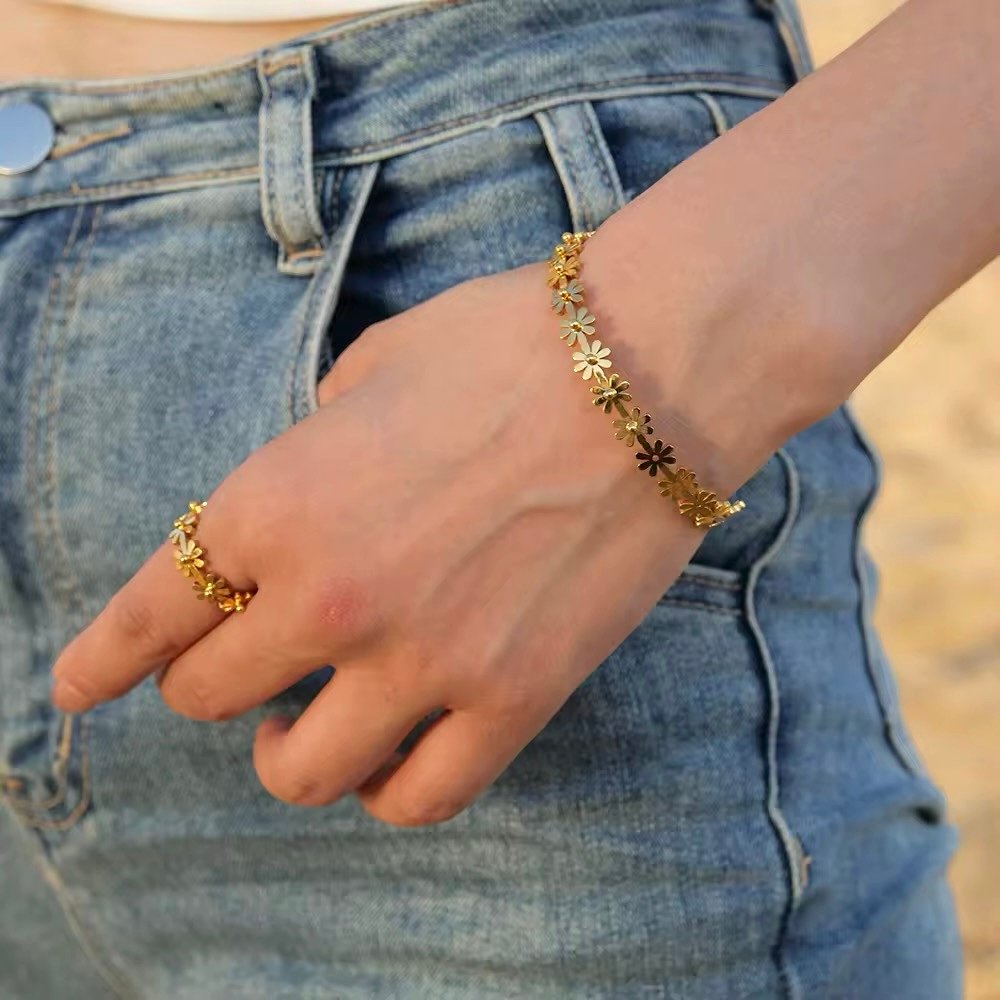 Gold Plated Daisy Flower Bangle with Cubic Zirconia